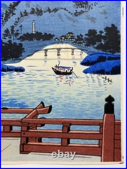 Signed Tokuriki Tomikichiro woodblock print Moon Night at Uji River