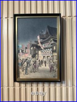 Vintage Japanese Woodblock Print Night Street Scene with Theater & Crowd