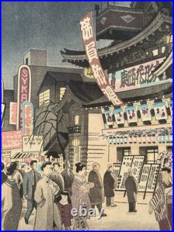 Vintage Japanese Woodblock Print Night Street Scene with Theater & Crowd
